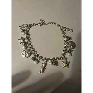 Under The Sea Gold Tone Charm Bracelet